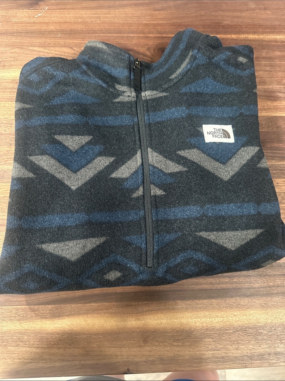 The North Face Men’s Zip-Up Fleece Sweater in Charcoal, Blue, and Gray